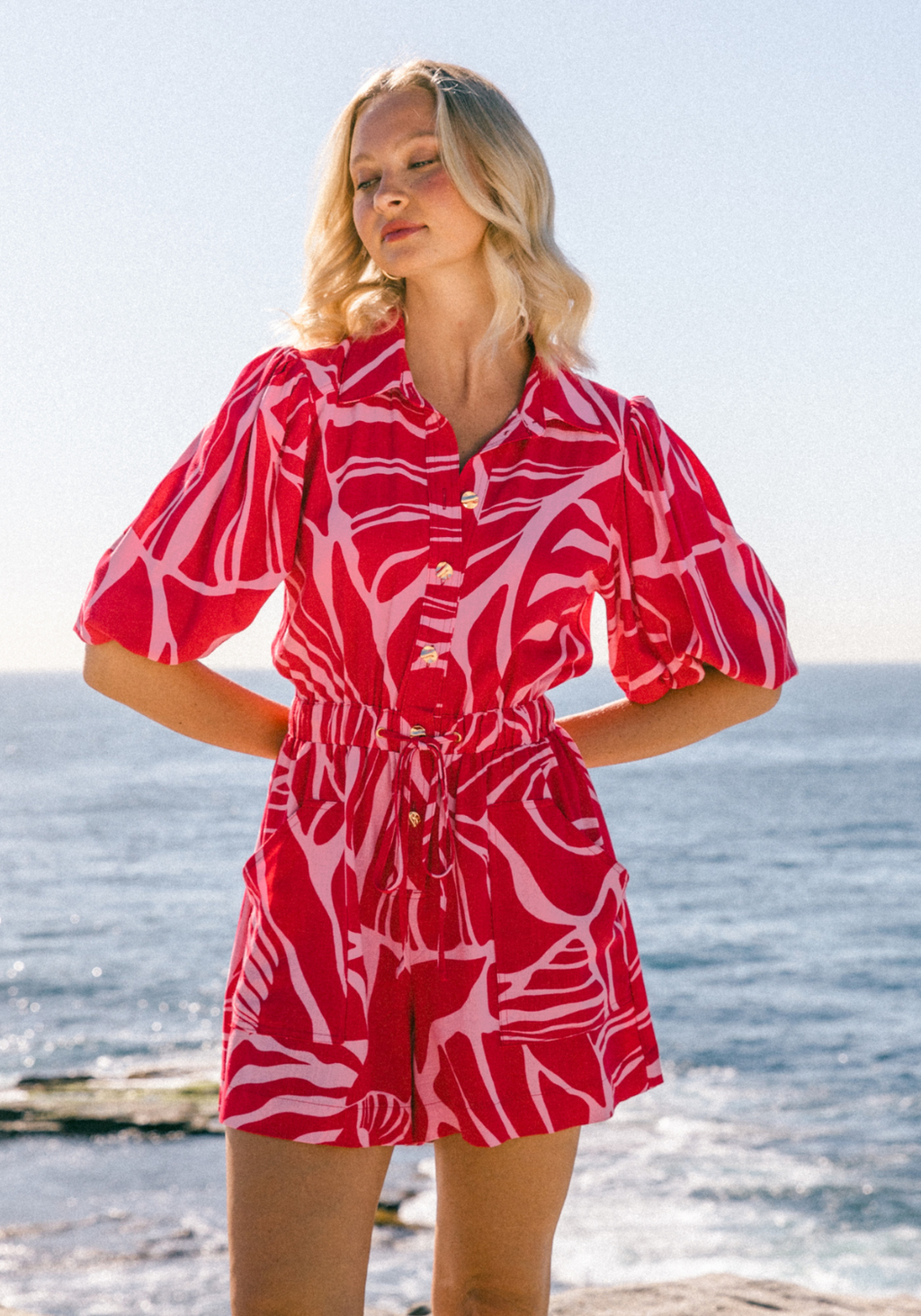 GAIA PLAYSUIT - RED/PINK PRINT