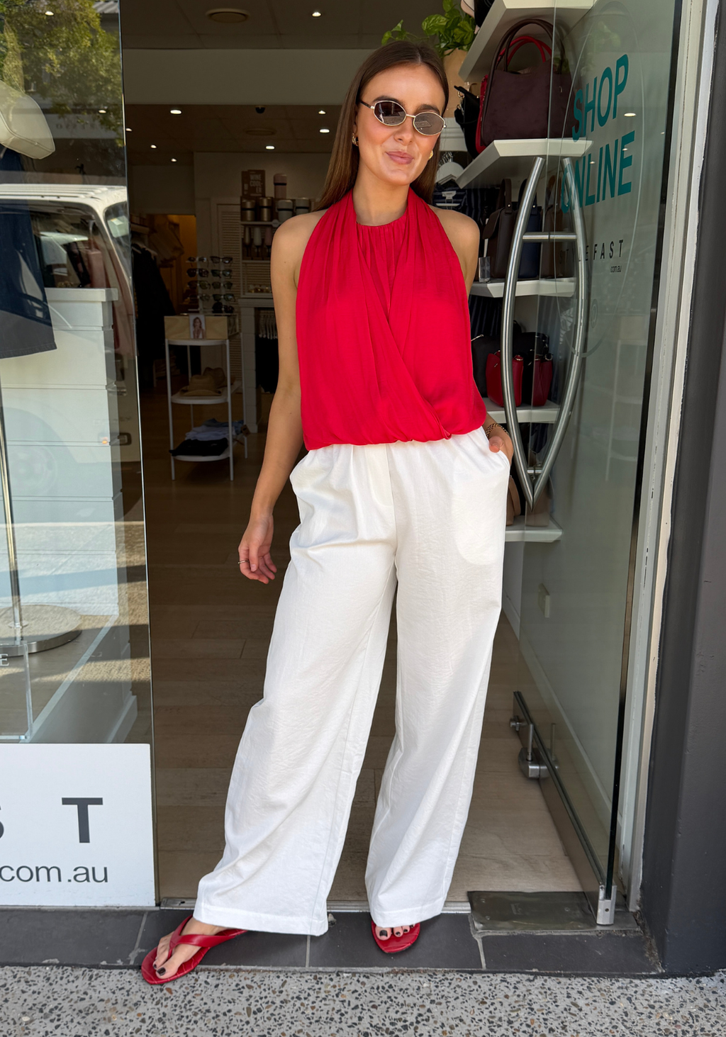 GOLDIE DRAPED FRONT BUBBLE HEM HALTER TOP - RED