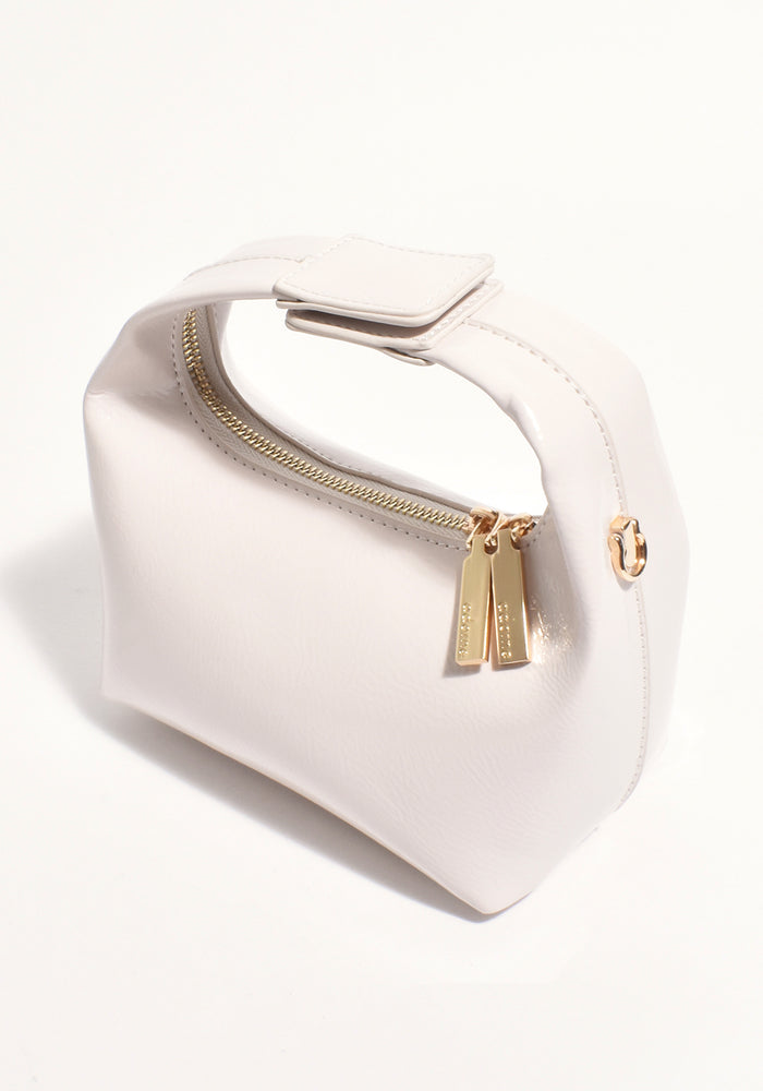 ADORNE LIA PATENT CURVED SMALL BAG - CREAM