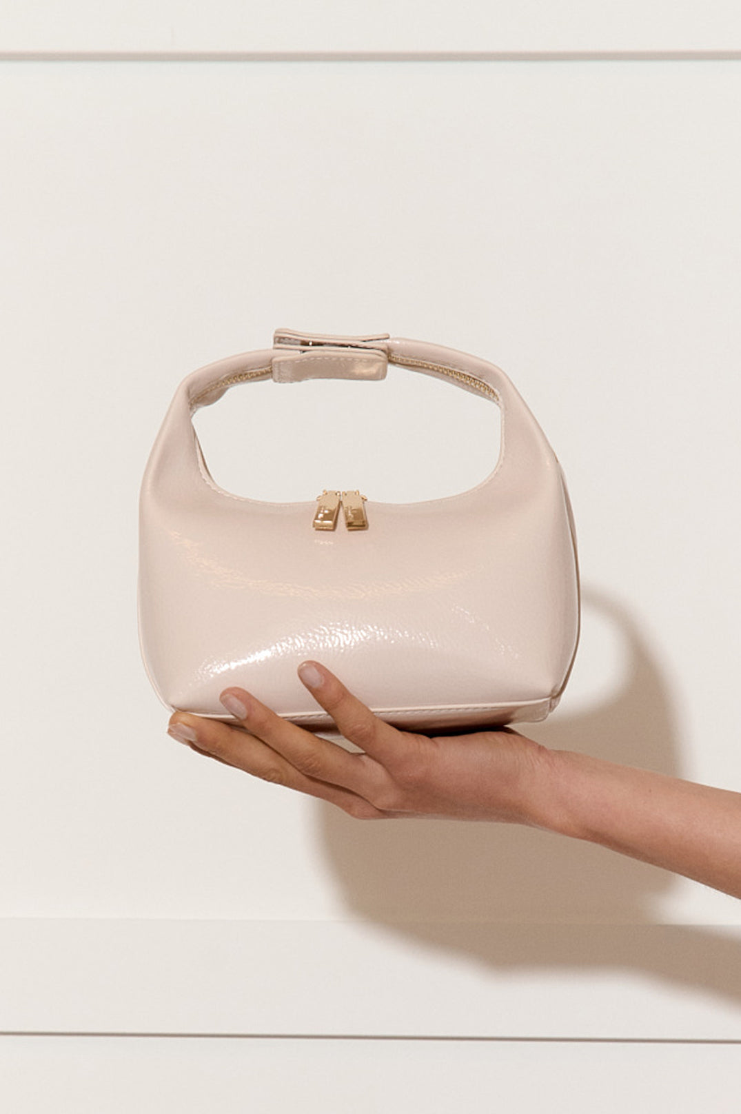 ADORNE LIA PATENT CURVED SMALL BAG - CREAM