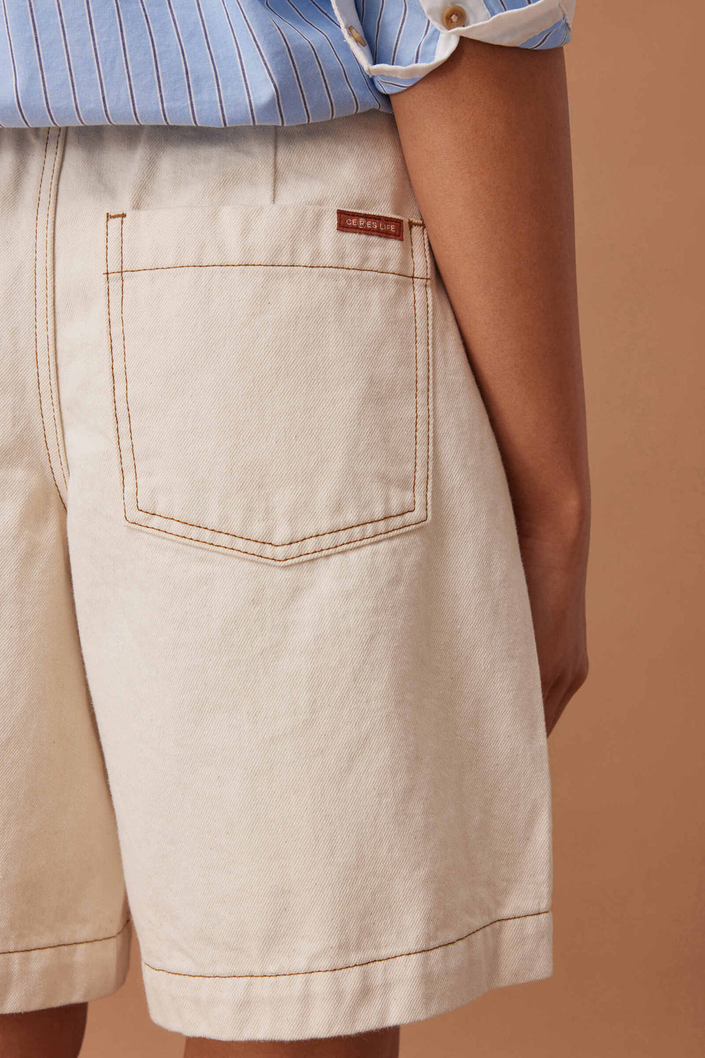 CERES LIFE SYLVIE LONGLINE PLEAT DENIM SHORT - NATURAL ECRU