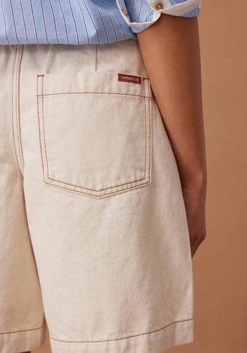 CERES LIFE SYLVIE LONGLINE PLEAT DENIM SHORT - NATURAL ECRU